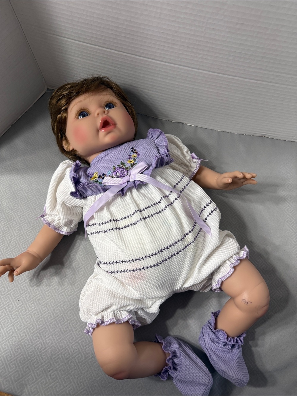 Aori Reborn Lifelike Baby Girl Doll in Lavender Embroidered Outfit Soft Body - Picture 9 of 10